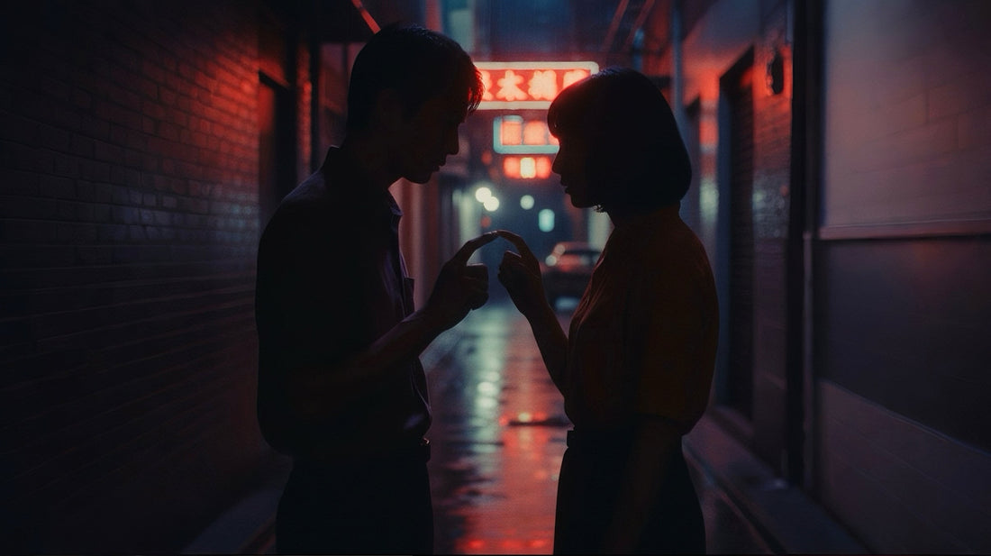 Close up of hand touching shoulder, cinematic romantic lighting.